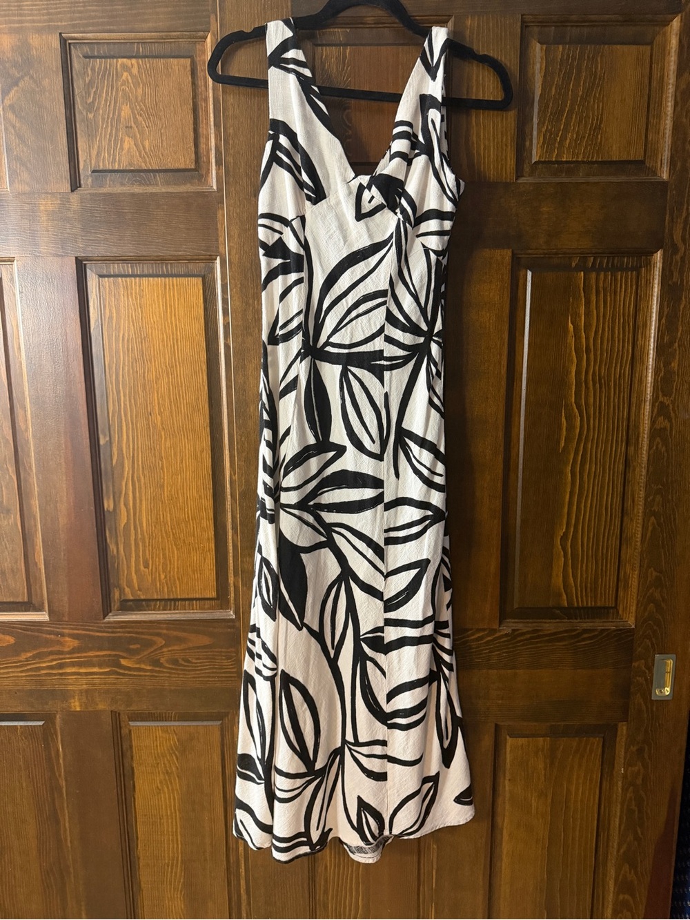 Sleeveless Black & White Maxi Dress with Bold Leaf Print